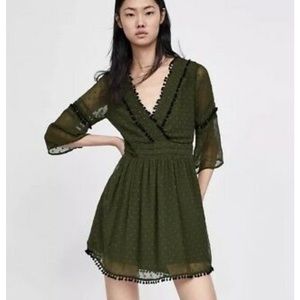 Olive green dress with pom Pom detail